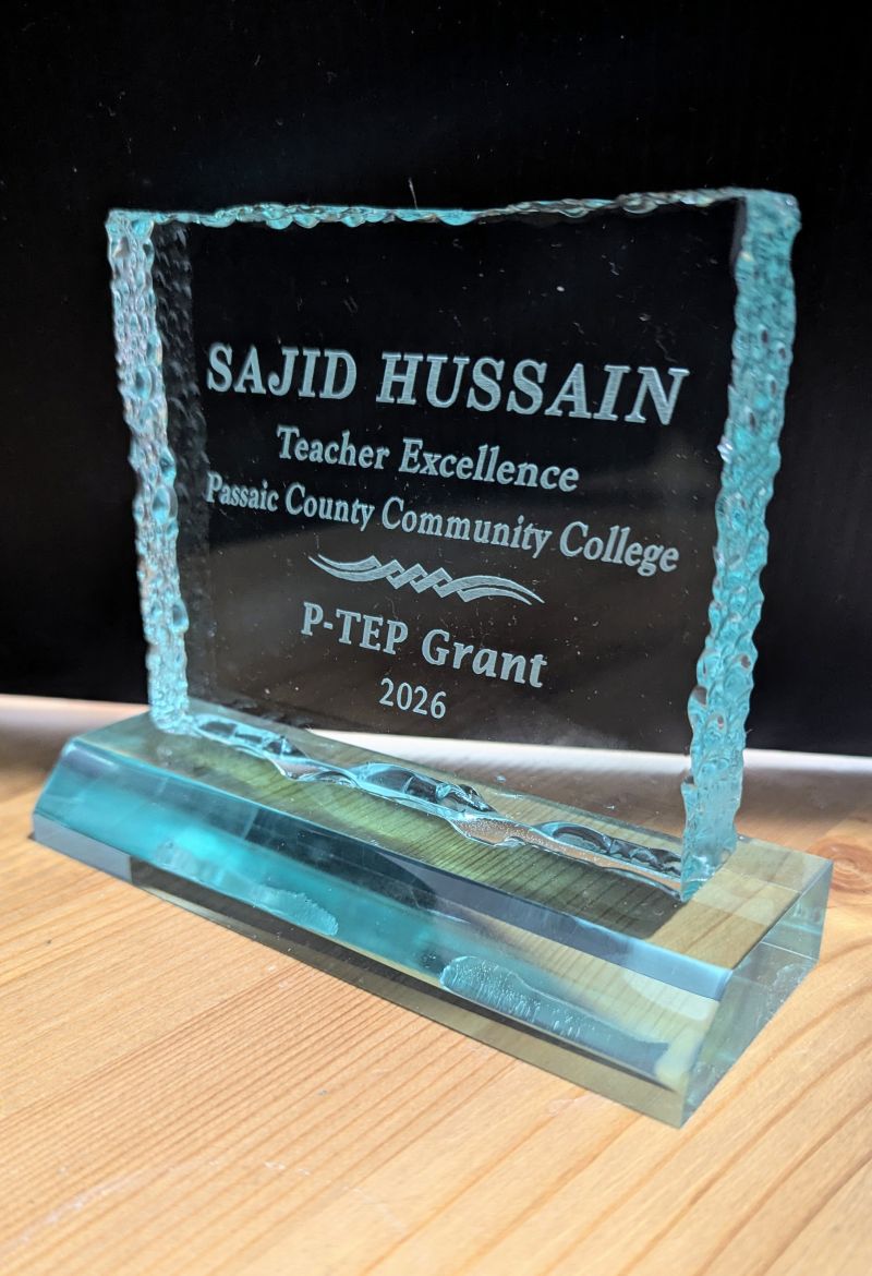 Sajid Hussain receiving faculty awards at Passaic County Community College